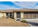 Front view of single story home with landscaping at 10079 Cara St, Spring Hill, FL 34608