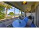 Screened patio overlooks a lake and has a grill at 1031 Emerald Dunes Dr, Sun City Center, FL 33573