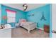 bedroom with white bed and Paris theme at 10409 Waterstone Dr, Riverview, FL 33578