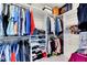 Large walk-in closet with ample shelving and hanging space at 10409 Waterstone Dr, Riverview, FL 33578