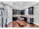Modern kitchen featuring dark wood cabinets and stainless steel appliances at 10409 Waterstone Dr, Riverview, FL 33578