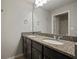 Bathroom with double vanity and granite countertop at 10637 Park Meadowbrooke Dr, Riverview, FL 33578