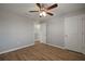 Bedroom with ceiling fan and wood-look floors at 10637 Park Meadowbrooke Dr, Riverview, FL 33578