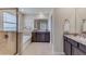 Bathroom with double vanity, soaking tub and shower at 10825 Patoka Ter, Parrish, FL 34219