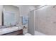 Clean bathroom with shower/tub combo and granite vanity at 10825 Patoka Ter, Parrish, FL 34219