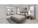 Spacious bedroom with sitting area and large windows at 10825 Patoka Ter, Parrish, FL 34219