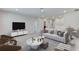 Spacious bonus room with a sofa and a view of the second floor at 10825 Patoka Ter, Parrish, FL 34219