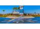 Community entrance with a water feature and signage at 10825 Patoka Ter, Parrish, FL 34219