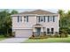 Two-story house with blue shutters and stone accents at 10825 Patoka Ter, Parrish, FL 34219