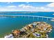 Waterfront property with bridge and city skyline in background at 110 Driftwood Ln, Largo, FL 33770