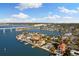 Expansive aerial showcasing waterfront homes, bridge, and waterways at 110 Driftwood Ln, Largo, FL 33770