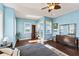Bright bedroom with balcony access and water views at 110 Driftwood Ln, Largo, FL 33770