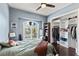 Bedroom with large window, walk-in closet, and plenty of natural light at 110 Driftwood Ln, Largo, FL 33770