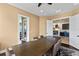Elegant dining room with large table and views into kitchen at 110 Driftwood Ln, Largo, FL 33770