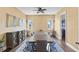 Spacious dining room offering a view and hardwood floors at 110 Driftwood Ln, Largo, FL 33770