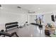 Home gym with various equipment and waterfront views at 110 Driftwood Ln, Largo, FL 33770
