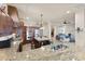 Open kitchen boasts stainless steel appliances and granite counters at 110 Driftwood Ln, Largo, FL 33770