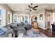 Relaxing living room with water views and comfortable sectional sofa at 110 Driftwood Ln, Largo, FL 33770