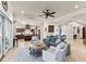 Open living room with kitchen views and a cozy seating area at 110 Driftwood Ln, Largo, FL 33770