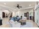 Bright and airy living room with comfortable seating and high ceilings at 110 Driftwood Ln, Largo, FL 33770