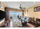 Media room with water views, exercise bike, and comfortable seating at 110 Driftwood Ln, Largo, FL 33770
