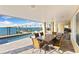 Waterfront patio with dining table and seating area at 110 Driftwood Ln, Largo, FL 33770