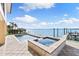 Enjoy waterfront views from this pool and spa at 110 Driftwood Ln, Largo, FL 33770