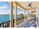 Relaxing balcony overlooking the water and bridge at 110 Driftwood Ln, Largo, FL 33770