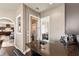 Wet bar with granite countertop, wine storage, and mini-fridge at 110 Driftwood Ln, Largo, FL 33770