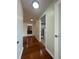 Hardwood floor hallway with access to kitchen and bath at 1100 N Shore Ne Dr # 403, St Petersburg, FL 33701