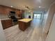 Modern kitchen with stainless steel appliances and an island at 1100 N Shore Ne Dr # 403, St Petersburg, FL 33701