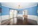 Bright dining room with hardwood floors and wainscoting at 118 Laurel Tree Way, Brandon, FL 33511