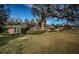 Brick home with mature landscaping and a large yard at 118 Laurel Tree Way, Brandon, FL 33511