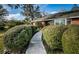 Brick home with walkway and manicured landscaping at 118 Laurel Tree Way, Brandon, FL 33511