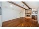 Spacious living room with hardwood floors and exposed beams at 118 Laurel Tree Way, Brandon, FL 33511