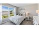 Bright bedroom with a comfortable bed and large window at 17347 Wheatberry Blvd, Parrish, FL 34219