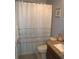 Clean bathroom with granite vanity and updated shower at 1922 Echo Pond Pl, Wesley Chapel, FL 33543