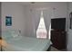 Bedroom with a full-size bed and a dresser at 1922 Echo Pond Pl, Wesley Chapel, FL 33543