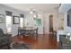 Dining area with hardwood floors and an adjacent kitchen at 1922 Echo Pond Pl, Wesley Chapel, FL 33543