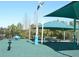 Community playground with shaded areas at 1922 Echo Pond Pl, Wesley Chapel, FL 33543