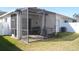 Spacious screened patio, perfect for outdoor grilling and relaxation at 1922 Echo Pond Pl, Wesley Chapel, FL 33543