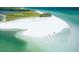 Aerial view of secluded beach with white sand and clear water at 2700 Bayshore Blvd # 11301, Dunedin, FL 34698