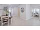 Farmhouse dining table with view of home office at 28818 Orange Berry Dr, Wesley Chapel, FL 33543