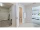 Home features hallway with access to bedroom, closet, and bathroom at 28818 Orange Berry Dr, Wesley Chapel, FL 33543