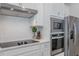 Stainless steel appliances and white cabinets at 28818 Orange Berry Dr, Wesley Chapel, FL 33543