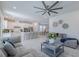Open concept living room and kitchen area at 28818 Orange Berry Dr, Wesley Chapel, FL 33543