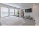 Main bedroom with ensuite bathroom and sitting area at 28818 Orange Berry Dr, Wesley Chapel, FL 33543