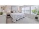 Bright and airy main bedroom with plush carpet and large windows at 28818 Orange Berry Dr, Wesley Chapel, FL 33543