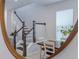 Modern staircase with dark wood and white railings at 28818 Orange Berry Dr, Wesley Chapel, FL 33543