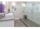 Modern bathroom with double sinks and a large shower at 2920 W Trilby Ave, Tampa, FL 33611